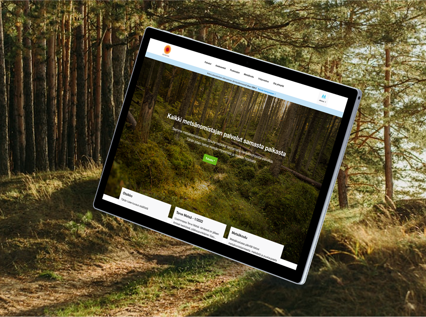 Stora Enso metsän etusivu tabletilla. Taustalla havumetsä.
