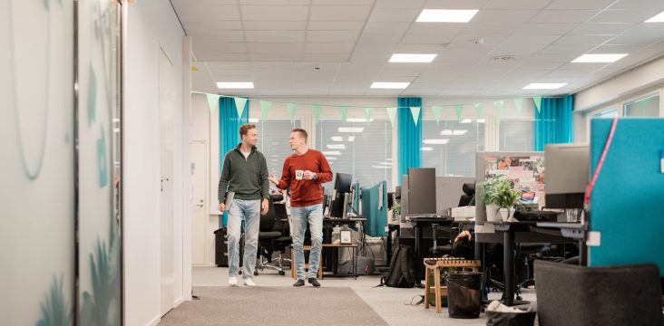 A coffee-break walk through a bright office – Managing client experience lead to growth